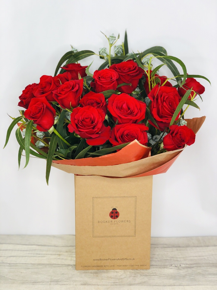 <h2>Eighteen Red Roses - Handtied Bouquet</h2>
<br>
<ul>
<li>Approximate Dimensions: 55cm x 40cm</li>
<li>Flowers arranged by hand and gift wrapped in our signature eco-friendly packaging and finished off with a hidden wooden ladybird</li>
<li>To give you the best occasionally we may make substitutes</li>
<li>Our flowers backed by our 7 days freshness guarantee</li>
<li>For delivery area coverage see below</li>
</ul>
<br>
<h2>Flower Delivery Coverage</h2>
<p>Our shop delivers flowers to the following Liverpool postcodes L1 L2 L3 L4 L5 L6 L7 L8 L11 L12 L13 L14 L15 L16 L17 L18 L19 L24 L25 L26 L27 L36 L70 If your order is for an area outside of these we can organise delivery for you through our network of florists. We will ask them to make as close as possible to the image but because of the difference in stock and sundry items it may not be exact.</p>
<br>
<h2>Hand-tied Bouquet | 18 Red Roses</h2>
<p>These beautiful roses hand-arranged by our professional florists into a hand-tied bouquet are a delightful choice. This bouquet of eighteen red roses would make the perfect gift or to celebrate an Anniversary.</p>
<p>Handtied bouquets are a lovely display of fresh flowers that have the wow factor. The advantage of having a bouquet made this way is that they are artfully arranged by our florists and tied so that they stay in the display.</p>
<p>They are then gift wrapped and aqua packed in a water bubble so that at no point are the flowers out of water. This means they look their very best on the day they arrive and continue to delight for days after.</p>
<p>Being delivered in a transporter box and in water means the recipient does not need to put the flowers in a vase straight away they can just put them down and enjoy.</p>
<p>Featuring 18 large-headed red roses together with mixed seasonal foliages.</p>
<br>
<h2>Eco-Friendly Liverpool Florists</h2>
<p>As florists we feel very close earth and want to protect it. Plastic waste is a huge problem in the florist industry so we made the decision to make our packaging eco-friendly.</p>
<p>To achieve this we worked with our packaging supplier to remove the lamination off our boxes and wrap the tops in an Eco Flowerwrap which means it easily compostable or can be fully recycled.</p>
<p>Once you have finished enjoying your flowers from us they will go back into growing more flowers! Only a small amount of plastic is used as a water bubble and this is biodegradable.</p>
<p>Even the sachet of flower food included with your bouquet is compostable.</p>
<p>All our bouquets have small wooden ladybird hidden amongst them so do not forget to spot the ladybird and post a picture on our social media pages to enter our rolling competition.</p>
<br>
<h2>Flowers Guaranteed for 7 Days</h2>
<p>Our 7-day freshness guarantee should give you confidence that we will only send out good quality flowers.</p>
<p>Leave it in our hands we will create a marvellous bouquet which will not only look good on arrival but will continue to delight as the flowers bloom.</p>
<br>
<h2>Liverpool Flower Delivery</h2>
<p>We are open 7 days a week and offer advanced booking flower delivery same-day flower delivery 3-hour flower delivery. Guaranteed AM PM or Evening Flower Delivery and also offer Sunday Flower Delivery.</p>
<p>Our florists deliver in Liverpool and can provide flowers for you in Liverpool Merseyside. And through our network of florists can organise flower deliveries for you nationwide.</p>
<br>
<h2>The Best Florist in Liverpool your local Liverpool Flower Shop</h2>
<p>Come to Booker Flowers and Gifts Liverpool for your beautiful flowers and plants. For that bit of extra luxury we also offer a lovely range of finishing touches such as wines champagne locally crafted Gin and Rum Vases Scented Candles and Chocolates that can be delivered with your flowers.</p>
<p>To see the full range see our extras section.</p>
<p>You can trust Booker Flowers and Gifts of delivery the very best for you.</p>
<p><br /><br /></p>
<p><em>5 Star review on Yell.com</em></p>
<br>
<p><em>Thank you Gemma for your fabulous service. The flowers are of the highest quality and delivered with a warm smile. My sister was delighted. Ordering was simple and the communications were top-notch. I will definitely use your services again.</em></p>